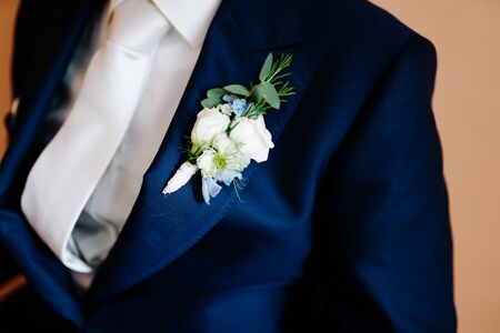 a groom's suit with flowersの写真素材