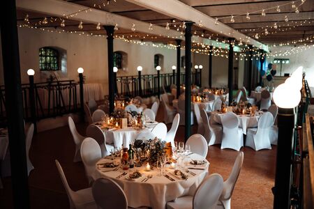 a wedding location with dinner tablesの写真素材