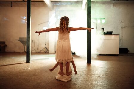 two girls dancing in a weddingの写真素材