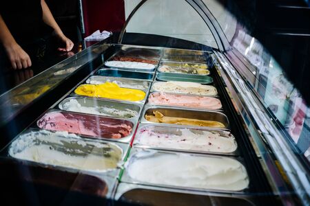 an ice cream store in the cityの写真素材