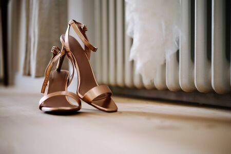 a brides sandals on the floorの写真素材