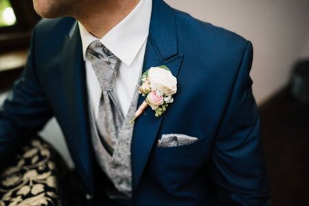 a groom's suit with flowersの写真素材