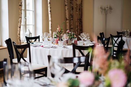 a wedding location with dinner tablesの写真素材
