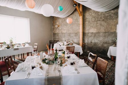 a wedding location with dinner tablesの写真素材