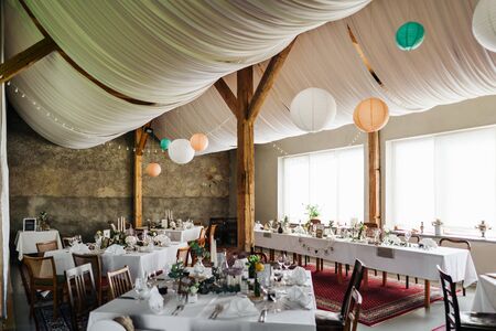 a wedding location with dinner tablesの写真素材