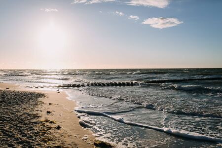a beautiful beach at sunsetの写真素材