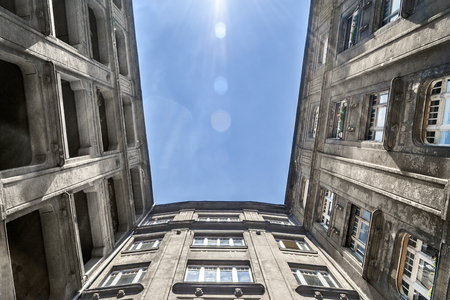 Old apartments with bright blue skyの写真素材