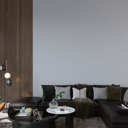 Interior of modern living room with gray walls, concrete floor, black leather sofas and coffee...