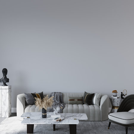 Interior of modern living room with white walls, concrete floor, gray sofa, coffee table and armchairs. 3d renderの写真素材