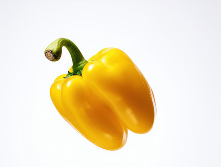 Yellow bell pepper isolated on white background. close up Studio shot.の素材