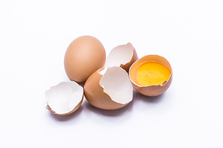 Chicken eggs on a white backgroundの写真素材