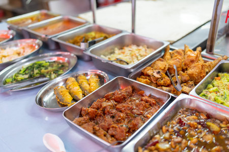 Buffet dishes at a local street restaurant in Bukit Bintang, Kuala Lumpur, Malaysia.の写真素材