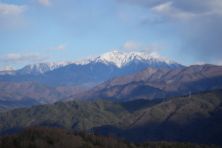 Snow-covered Mt. Senjogatake in Komagane City, Nagano Prefecture, Japan in winter.の写真素材