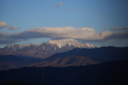 Mt. Senjogatake in the snow-covered sunset in Komagane City, Nagano Prefecture, Japan in winter.の写真素材