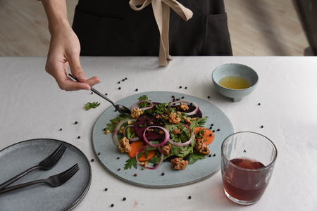 Salad on white tableの写真素材
