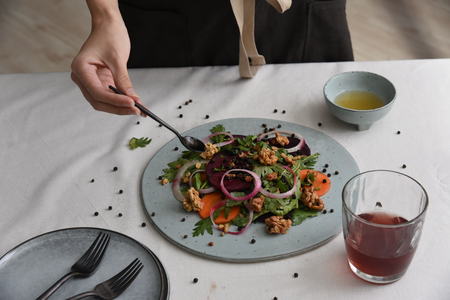 Salad on white tableの写真素材