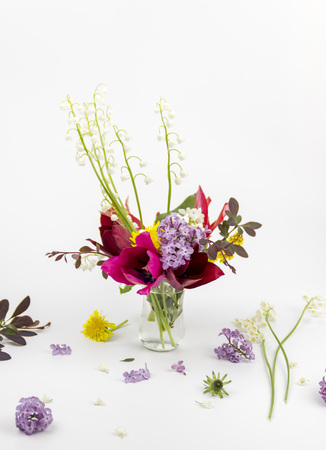 beautiful bouquet of flowers in vase on white backgroundの写真素材
