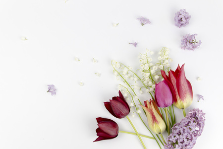 beautiful bouquet of flowers in vase on white background top view flat layの写真素材