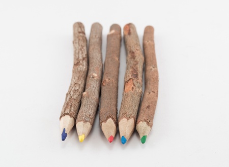 Wooden color pencils on a light backgroundの写真素材