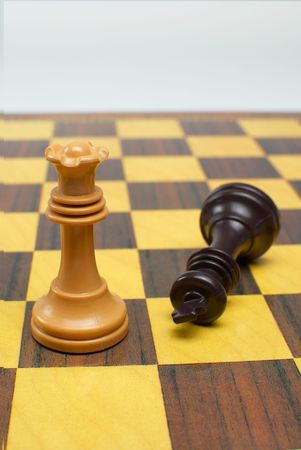 Checkmate,  Queen beats King on the board, female powerの写真素材