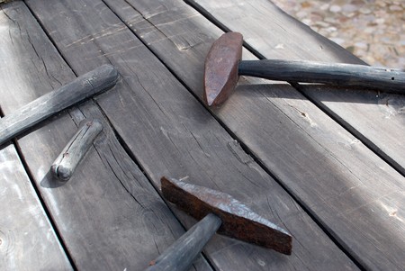 Old masonry utensils displayed in heritage workshopの写真素材