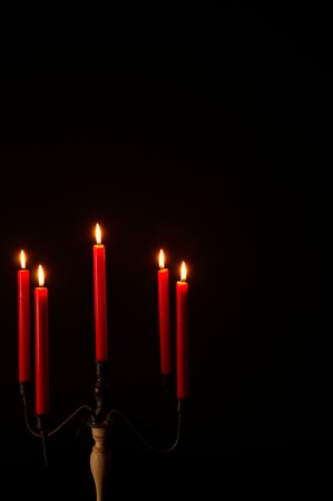 Five armed candlestick, romantic atmosphere on black with copy spaceの写真素材