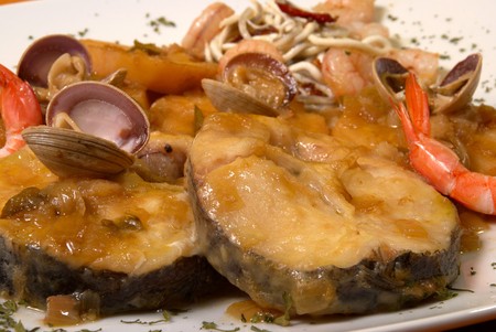 Hake with seafood in cider sauce, Spanish recipeの写真素材