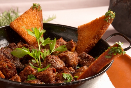 Hearty boar stew served in a small panの写真素材