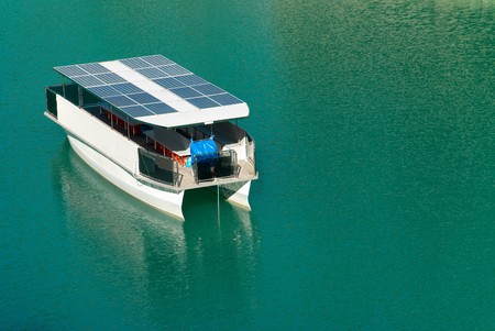 Innovative solar boat mooring in lake watersの写真素材