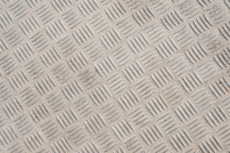 Full frame take of a sheet of diamond plate steelの写真素材