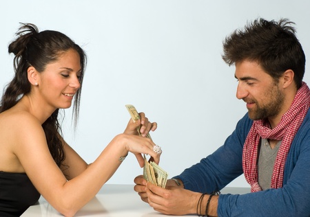 Couple  agreeing on sharing money, financial conceptの写真素材