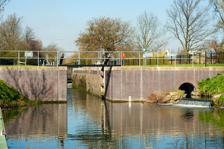 Lock on an English river canal, taditional waterwayの写真素材