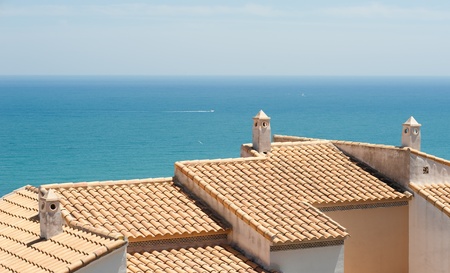 Tiled roofs with a spectacular ocean viewの写真素材