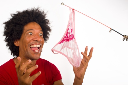 Guy about to bite onto the hook の写真素材