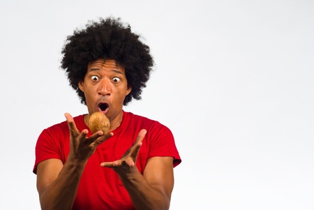Guy dealing with a hot potato, a concept