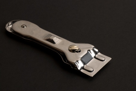 Metallic scraper as used for cleaning ceramic cooktopsの写真素材