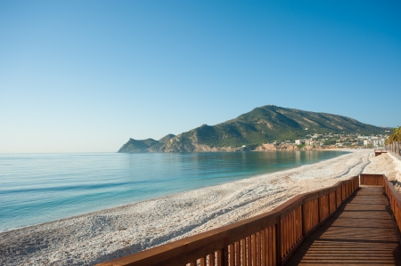 A user friendly walkway leading down to the beach from the promenadeの写真素材