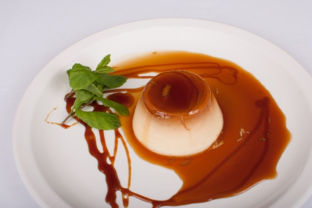 Spanish flan dessertl served with sweet syrup, a traditional dessertの写真素材