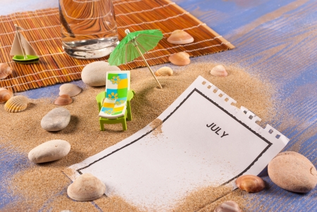 July tear off calendar page and a summer still lifeの写真素材