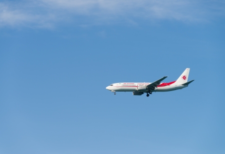 ALICANTE, SPAIN-  MARCH 20 : Air Algerie aeroplane approaches Alicante Airport. Air Algerie is the major carrier for flights connecting the Magreb with Mediterranean Europeのeditorial素材