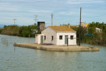 Traditional Valencian architecture  inside the waters of La Albuferaの写真素材