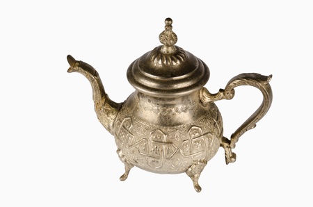 Ornate oriental  pewter teapot isolated on whiteの写真素材