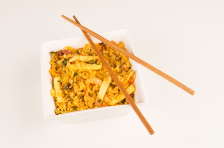 Bowl of Singapore rice isolated on whiteの写真素材