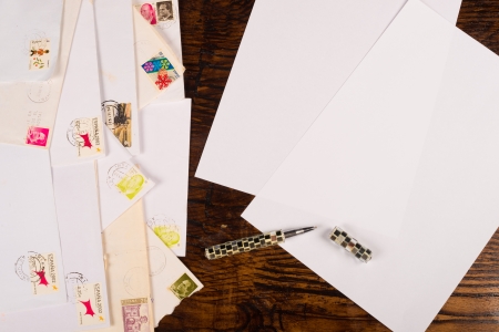 Envelopes, stamps and writing paper from the snail mail timesの写真素材
