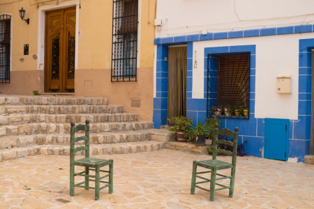 Andalusian village square with chairs ready to sit and have a chat onの写真素材