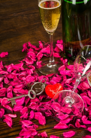 Champagne surrounded by a classic Valentines Day decorationの写真素材