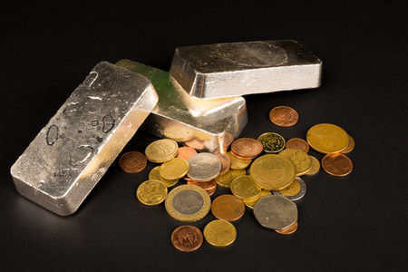 Silver bars and coins, a financial concept