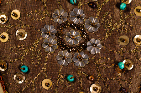 Full frame take of a handmade beaded fabric