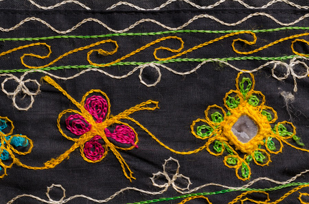 Full frame take of handmade fabric with floral motivesの写真素材