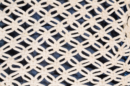 Full frame take of some coarse white knitware
